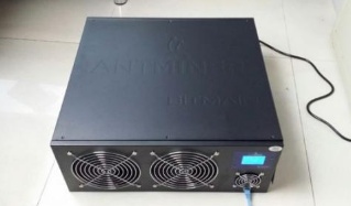A close-up of a Bitcoin mining rig with multiple graphics cards.